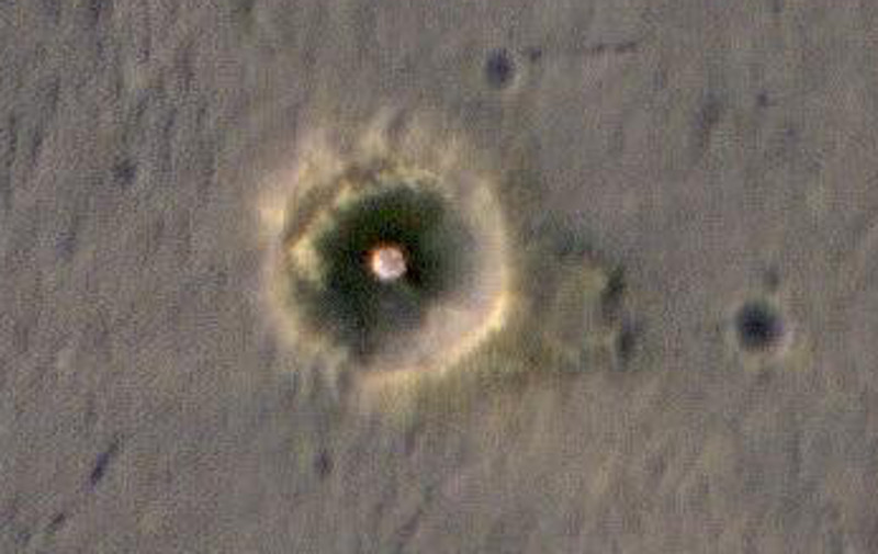 Yep, still there after 13 years. (Image credit: NASA/JPL-Caltech/Univ. of Arizona)